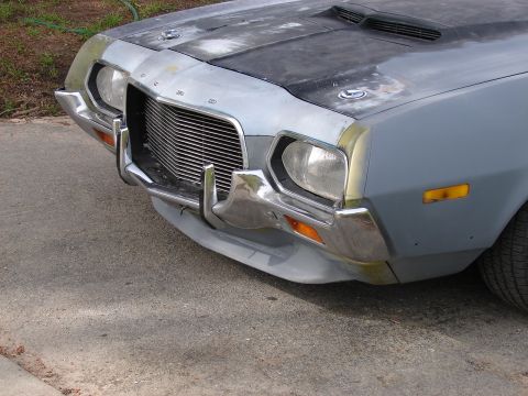 1973 Ford Ranchero - Front view of a 1973 Ford Ranchero, showing its distinctive grille and bumper details.