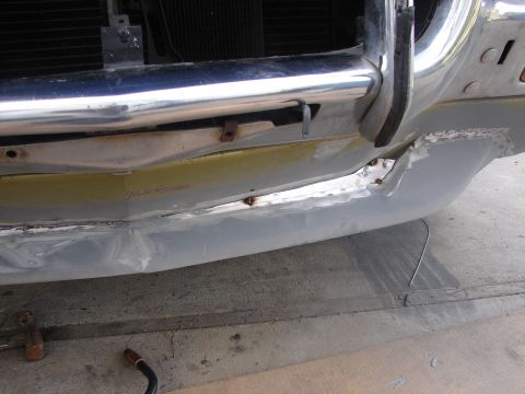 1973 Ford Ranchero - The front of a 1973 Ford Ranchero is visible, with the bumper area showing signs of recent bodywork and repair.