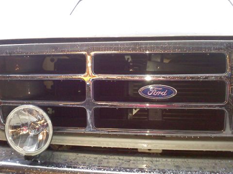 1992 Ford Bronco - The Ford emblem is clearly visible on the chrome grille of this vehicle.