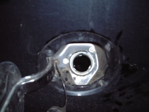 2000 Ford Excursion - Fuel filler neck opening on a vehicle.