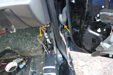 2007 Ford Crown Victoria - running the wiring though the door. there is an empty spot in the rubber to run the harness remove both ends and pushing it though the rubb…