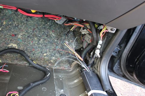 2007 Ford Crown Victoria - connect the two wiring harnesses under the kick panel area and make sure to ground the two black wires and get about 3 feet of wire to tap…