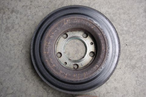 2006 Ford Fusion - Close-up of a used brake rotor, showing signs of wear and rust.