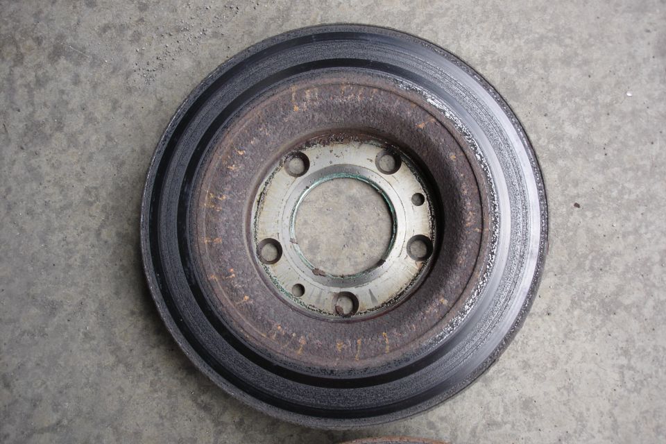 worn brake rotor with rust and scoring