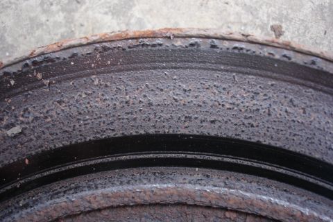 2006 Ford Fusion - This image shows a severely corroded brake rotor, not identifiable as a 2006 Ford Fusion.