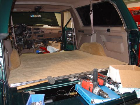 1995 Ford Bronco - Interior view of a 1995 Ford Bronco undergoing work, dashboard disassembled.
