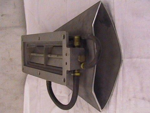 1972 Ford Ranchero - A custom metal air intake scoop with attached hoses and brass fittings is shown on a white cloth background.