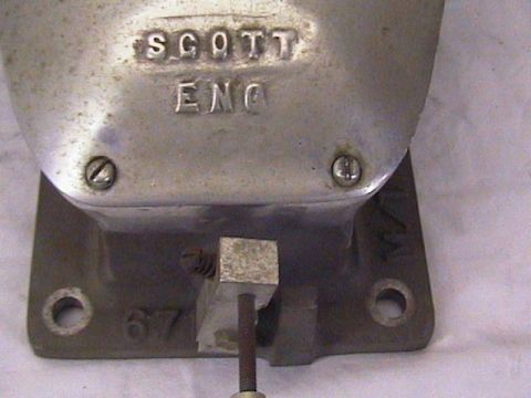 1972 Ford Ranchero - Close-up of a Scott Engineering part, possibly a fuel injector, with the number '67' stamped on its base.