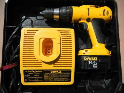 1997 Ford Ranger - A DeWalt cordless drill and its charger are shown inside a black carrying case.