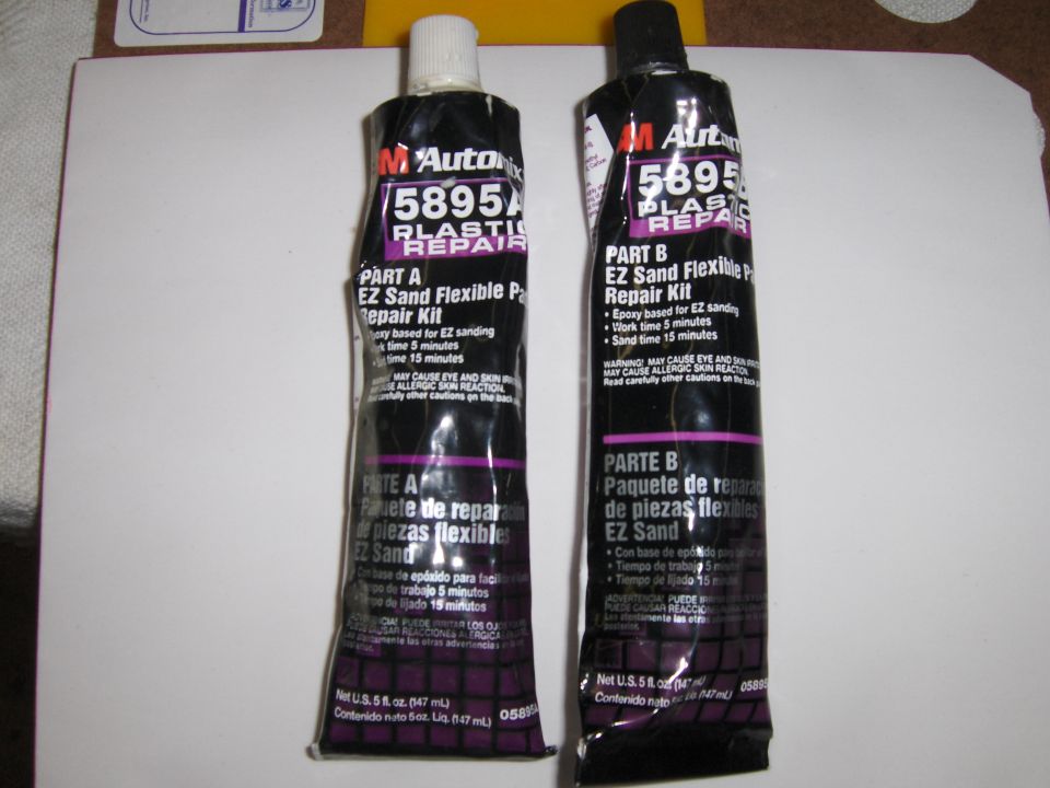 Two tubes of 3M 5895 plastic repair epoxy, Part A and Part B