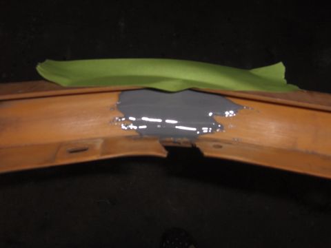 1980 Chevrolet Camaro - Repairing a damaged car bumper with body filler and masking tape.