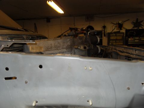 1997 Ford Ranger - The vehicle's frame and some engine components are visible in this garage setting.