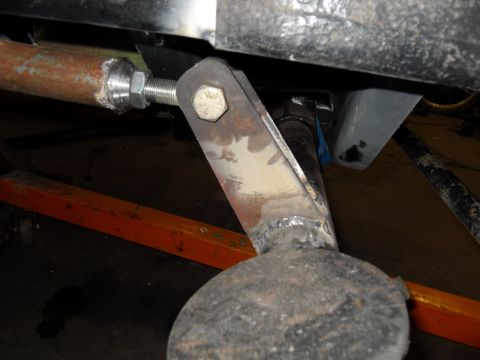 1997 Ford Ranger - Detail of a vehicle's undercarriage, showing a suspension part and mounting hardware.