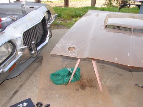 1973 Ford Ranchero - Front end of a 1972 Ford Ranchero is visible, with a separate hood resting nearby.