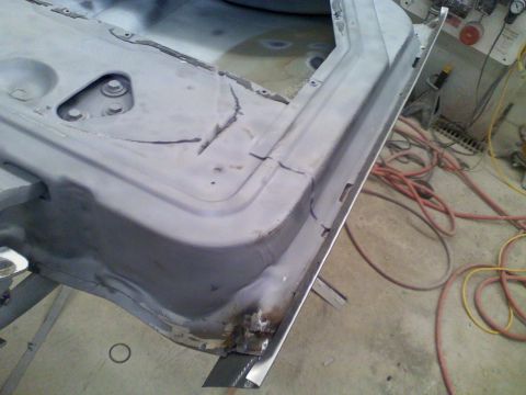 1979 Ford F-250 - Body panel repair in progress, focusing on the lower door frame and rocker panel area.