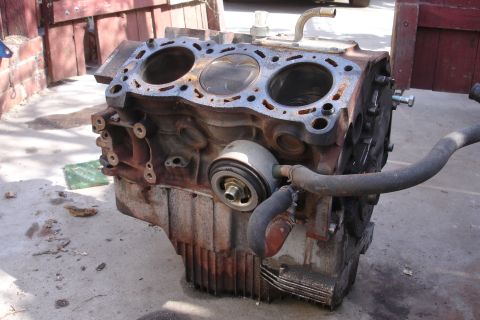 1993 Ford Taurus - This is a disassembled engine block, likely removed from a vehicle for repair or replacement.