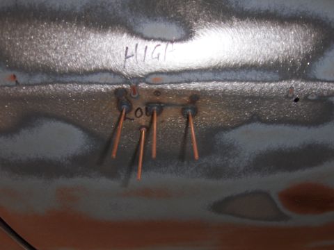 1980 Chevrolet Camaro - Welding test spots marked 'HIGH' and 'LOW' on a metal surface.