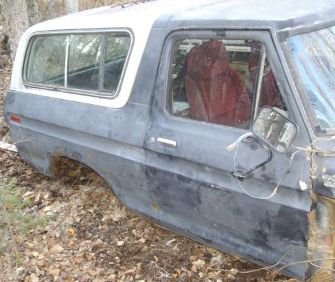 1979 Ford Bronco - This 1978 Ford Bronco is seen from the side, with its distinctive body style and interior visible.