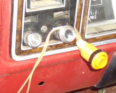 1978 Ford Bronco - Interior view of a 1978 Ford Bronco dashboard, showing accessory controls and gauges.