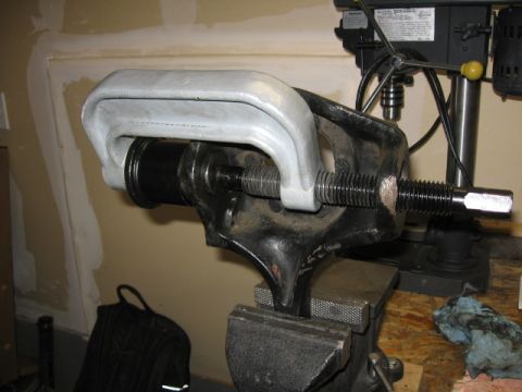 1995 Ford Bronco - This pic the lower BJ is removed and working on removal of the upper. Install starts with the upper and then the lower. The clamp remains i…