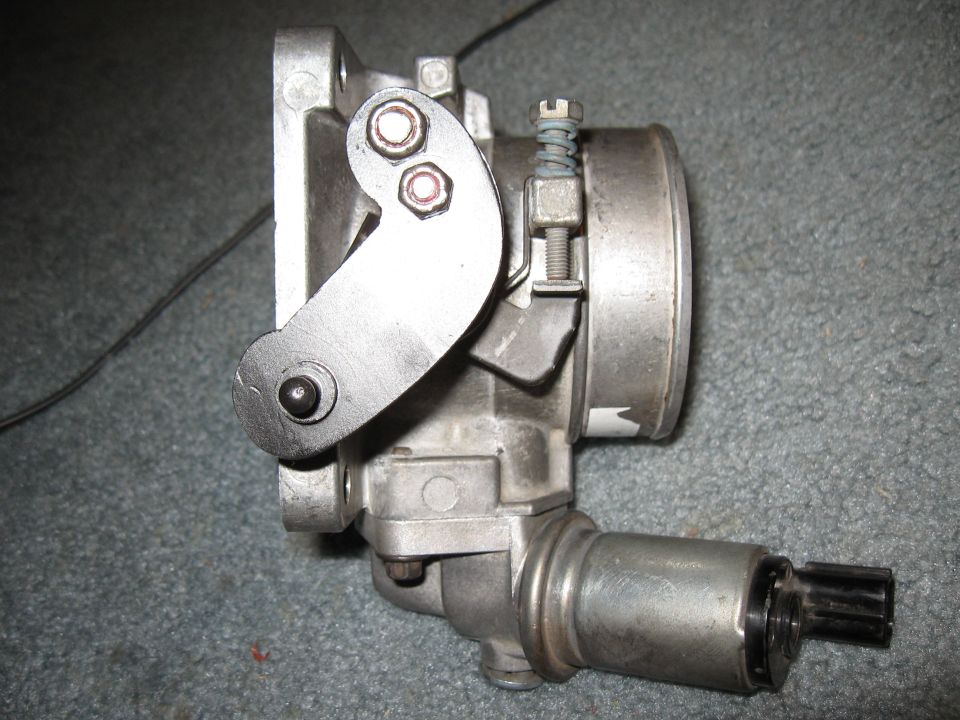 Throttle body with linkage and sensor