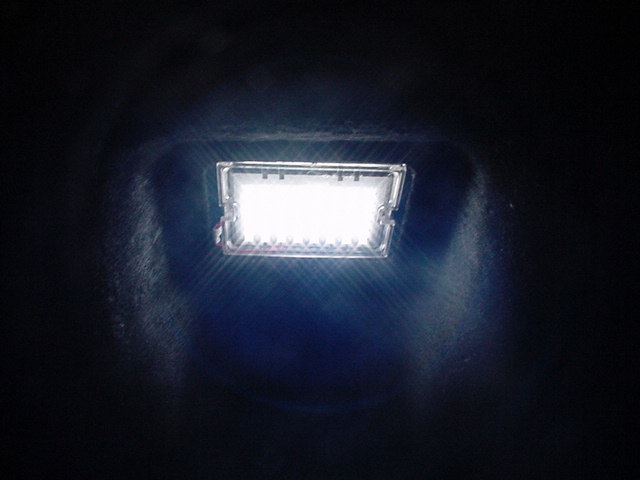 Bright white LED license plate or footwell light glowing in dark