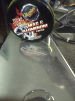 1998 Chevrolet Silverado 1500 - Meguiar's Hot Rims aluminum polish can is shown on a reflective surface.