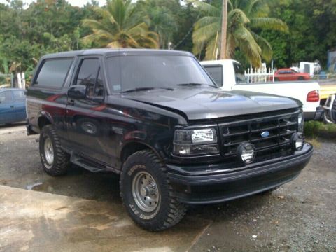1996 Ford Bronco - This 1996 Ford Bronco is shown in a 3q-front view, parked outdoors.
