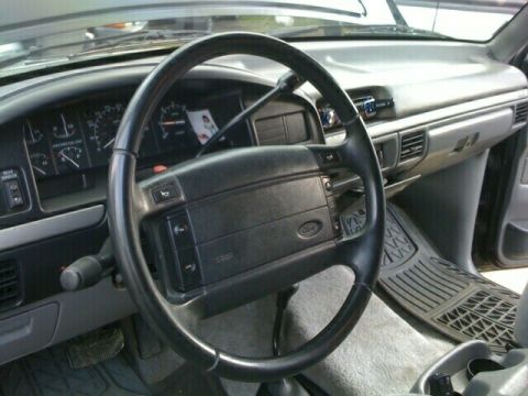 1996 Ford Bronco - The interior of a vehicle, likely a Ford truck from the early to mid-1990s, is visible.
