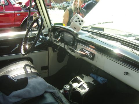 2007 Ford Mustang - Interior view of a classic car, possibly from the early 1960s, with a Pepsi can visible on the console.