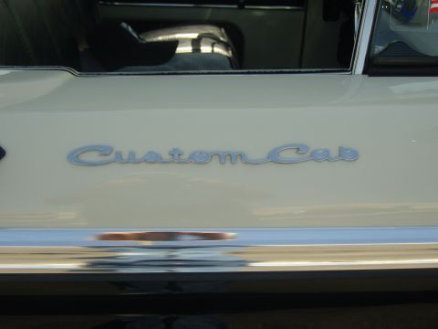 2007 Ford Mustang - The chrome 'Custom Cab' emblem is visible on the rear panel of the vehicle.