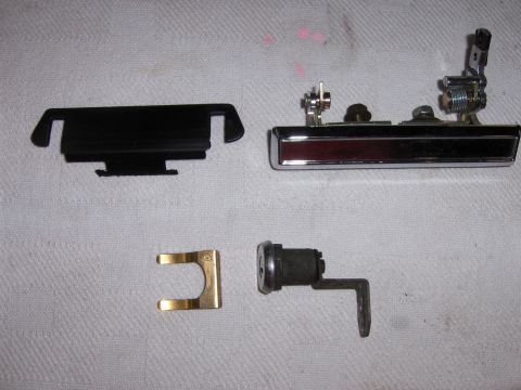 1980 Chevrolet Camaro - Car door handle, lock cylinder, and related parts are displayed on a white background.