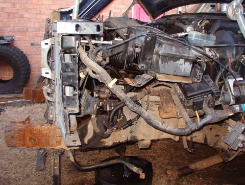 1993 Ford Bronco - It took a few hours with some big pry bars & wood blocks, but the core support straightened out pretty well.