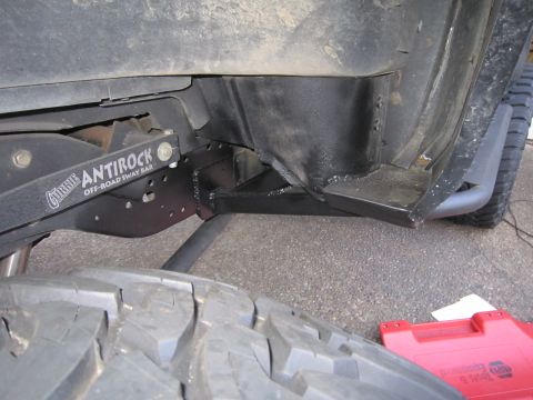1996 Ford Bronco - Close-up view of the Currie Antirock off-road sway bar and vehicle frame.