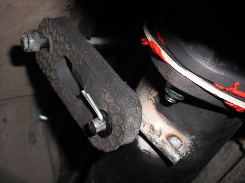 1991 Ford Bronco - Close-up view of a custom y-pipe assembly, showing its various metal and rubber components.