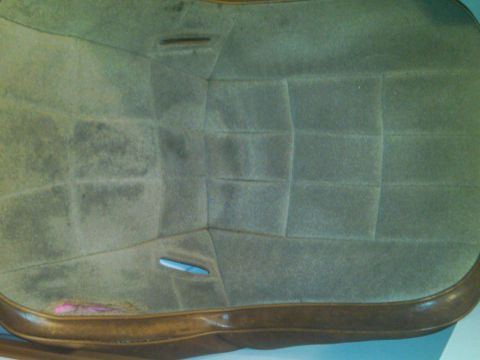 1986 Ford Bronco - Close-up of the interior upholstery, showing the textured fabric and brown trim.