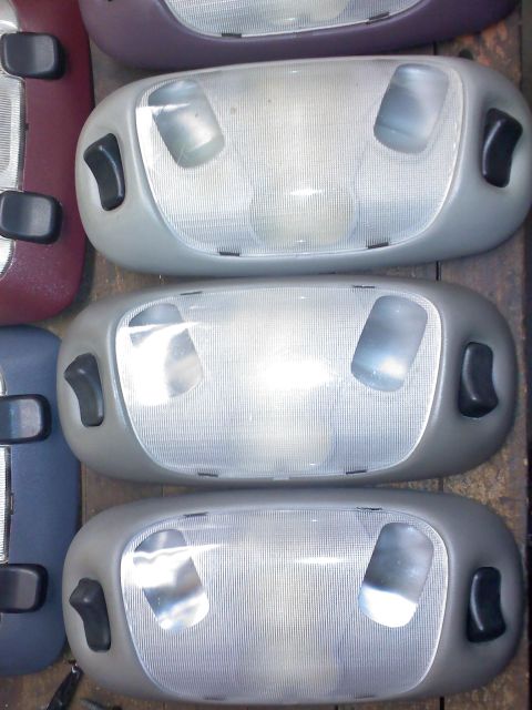 1992 Ford Bronco - Multiple interior dome lights are shown, each with two bulbs and a textured lens.