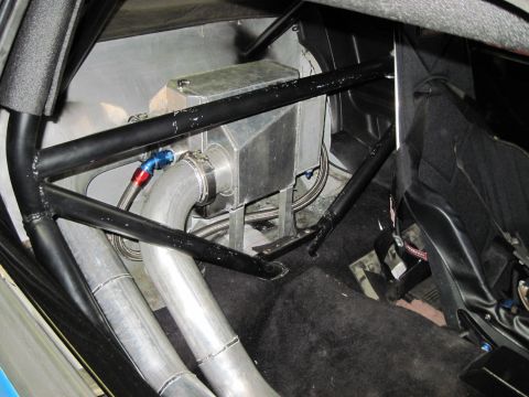 1992 Ford Mustang - Custom interior modifications including a roll cage and fuel cell are visible in this vehicle.