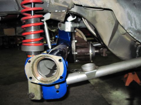 1992 Ford Mustang - Close-up view of vehicle suspension and differential components, likely during a repair or modification.