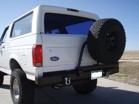 1993 Ford Bronco - Rear view of a 1993 Ford Bronco showing its aftermarket bumper and spare tire mount.