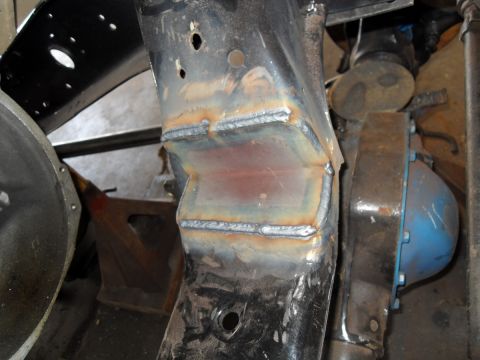 1997 Ford Ranger - This photo shows a section of a vehicle's frame that has undergone repair with new welds. A blue component is visible in the background.