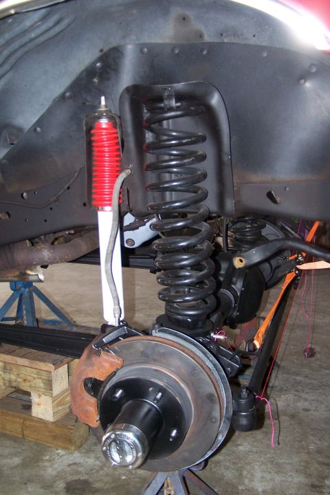 1990 Ford Bronco - Modified stock spring bucket with 2" removed.