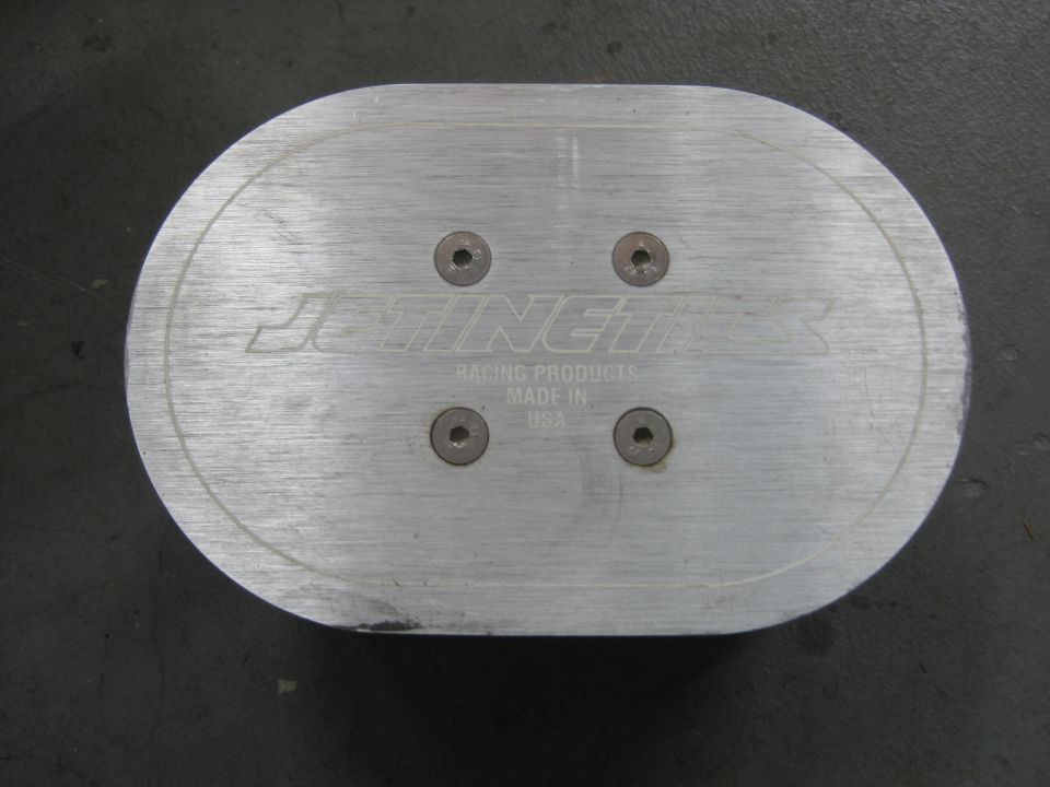 Oval aluminum part with 'BINGTH RACING PRODUCTS MADE IN USA' text