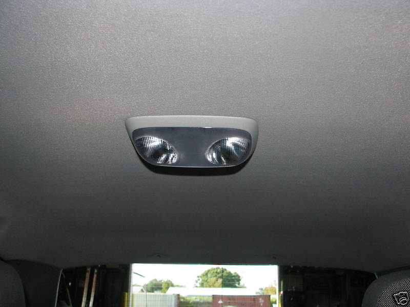 Interior overhead dome light with two bulbs
