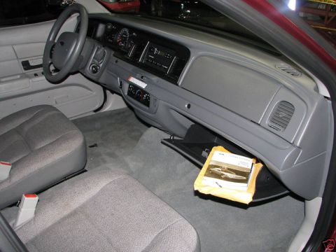 2005 Ford Crown Victoria - Interior view of a 2005 Ford Crown Victoria, including dashboard and seats.