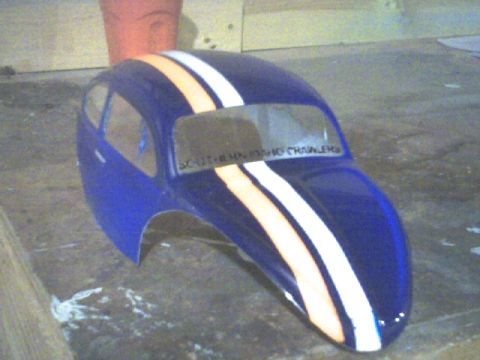 1989 Ford Bronco - This is a custom painted RC car body with racing stripes and text on the windshield.