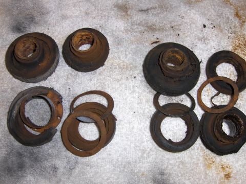 1980 Chevrolet Camaro - Collection of old, corroded suspension components, likely needing replacement.