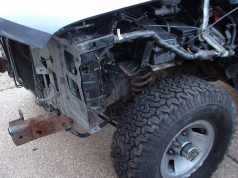 1993 Ford Bronco - With the replacement axle beam, it became semi-mobile again, so I moved it onto the driveway to install the shocks & a few other things. On…