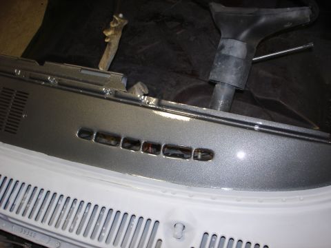 1979 Ford F-250 - Dashboard trim with vents and steering column shroud, possibly from an older vehicle.