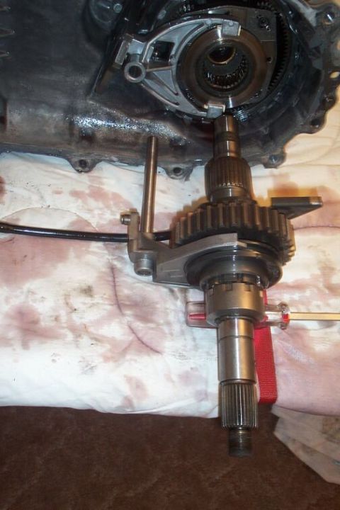 1990 Ford Bronco - You can now slide the front and rear cogs back toward you, bringing the chain with it. Here you see the rear assembly removed from the plan…